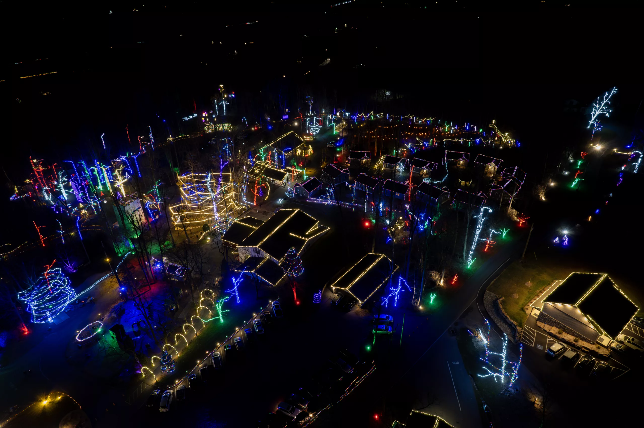 An Overhead Drone Shot Of Refreshing Mountain'S Christmas Light Experiences At Night