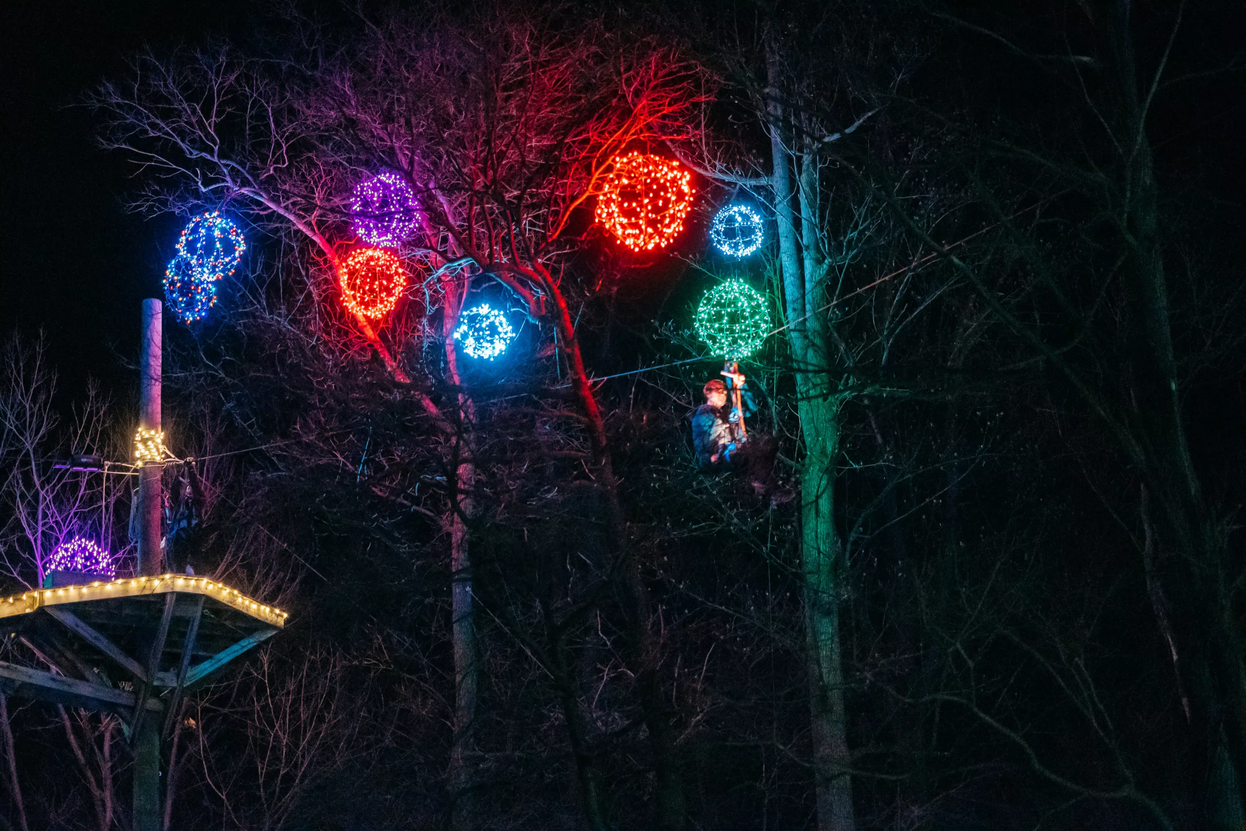 Balls Of Christmas Lights Hanging From Trees At Night At Refreshing Mountain
